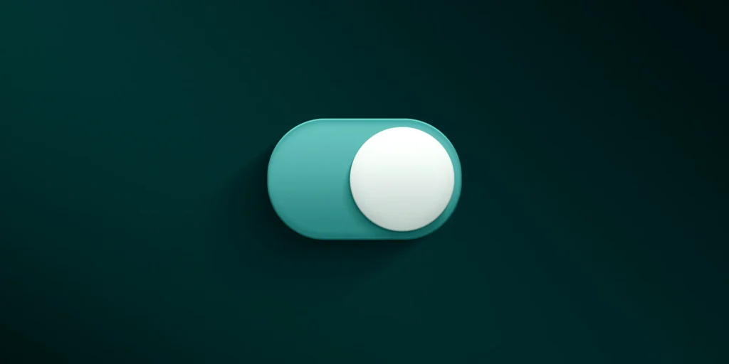 Un interruttore attivato su fondo verde petrolio